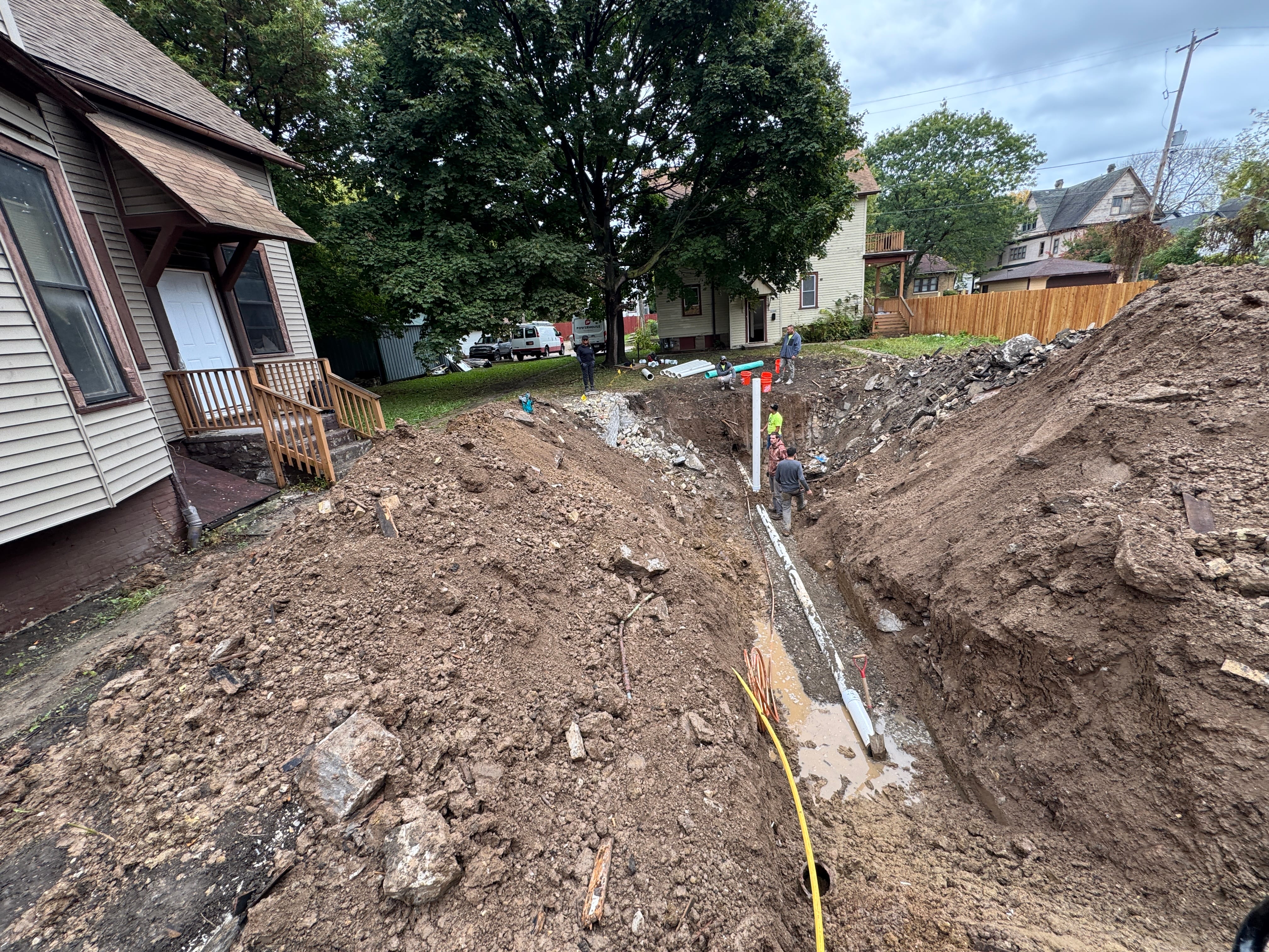 Wide trench excavation for sewer line replacement in Milwaukee