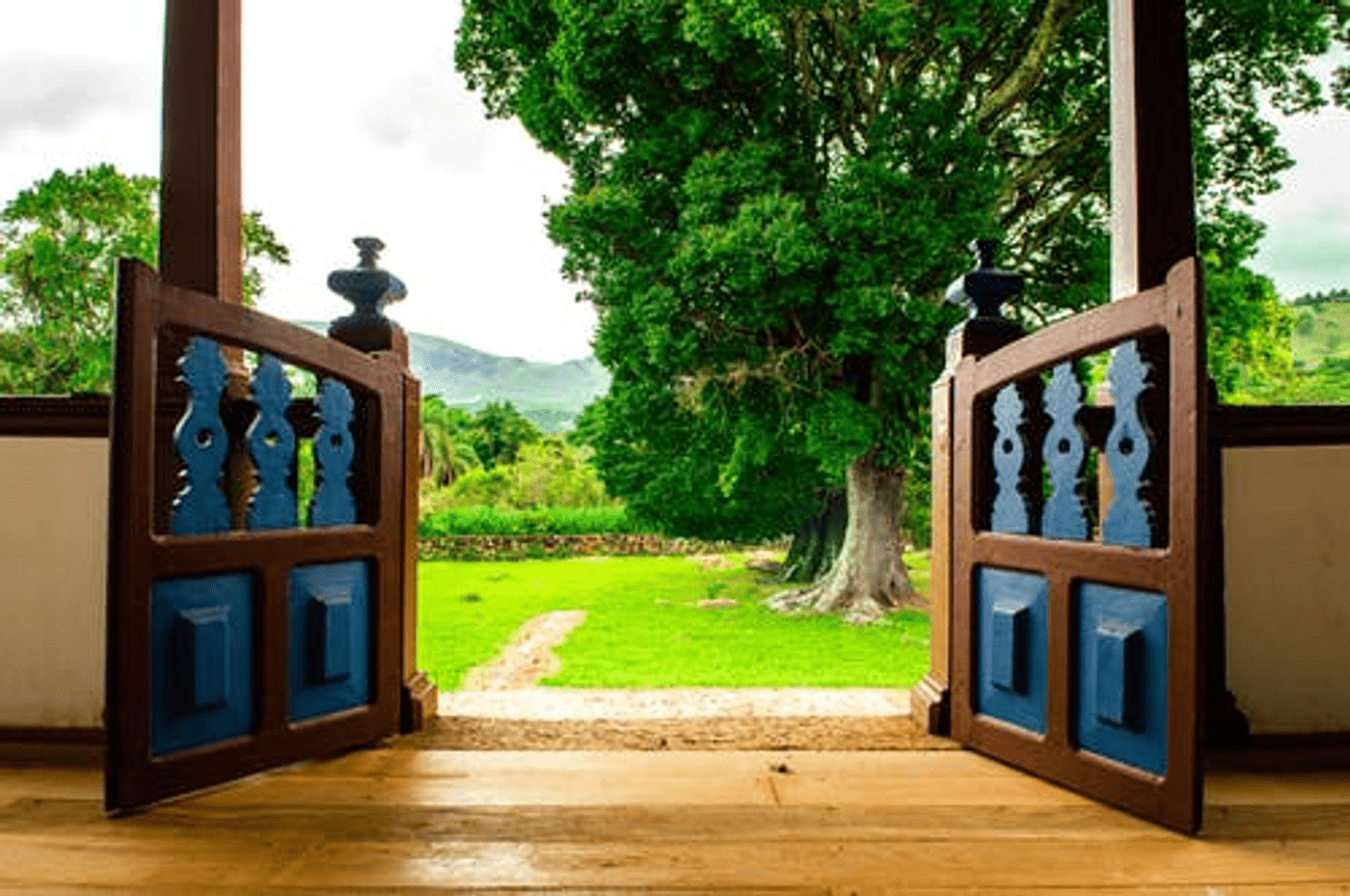 an entrance to a lawn