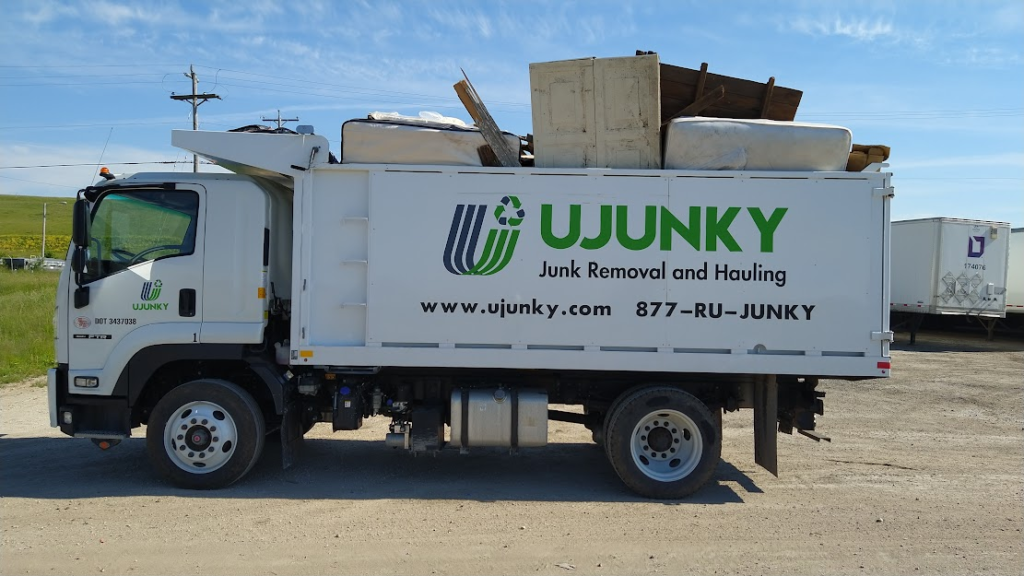 Debunking Commercial Junk Removal Myths 2 A commercial junk removal truck with junk